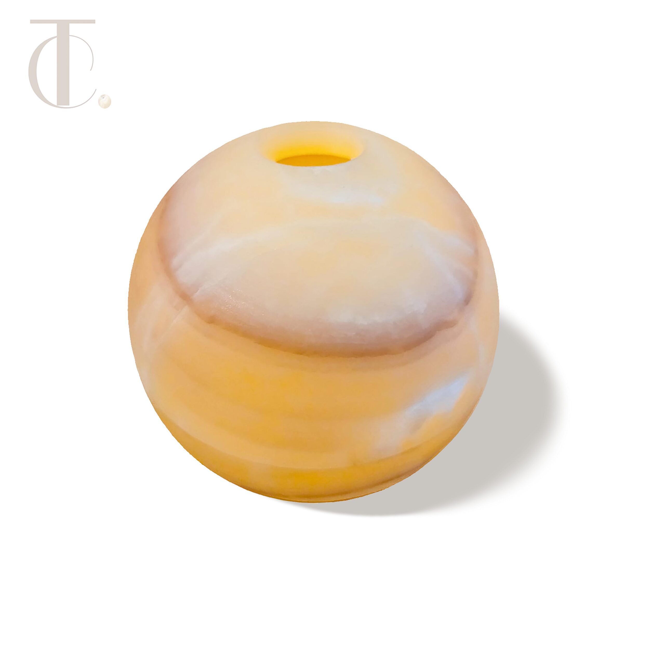 Illuminate your space with a handcrafted Onyx Stone Sphere.