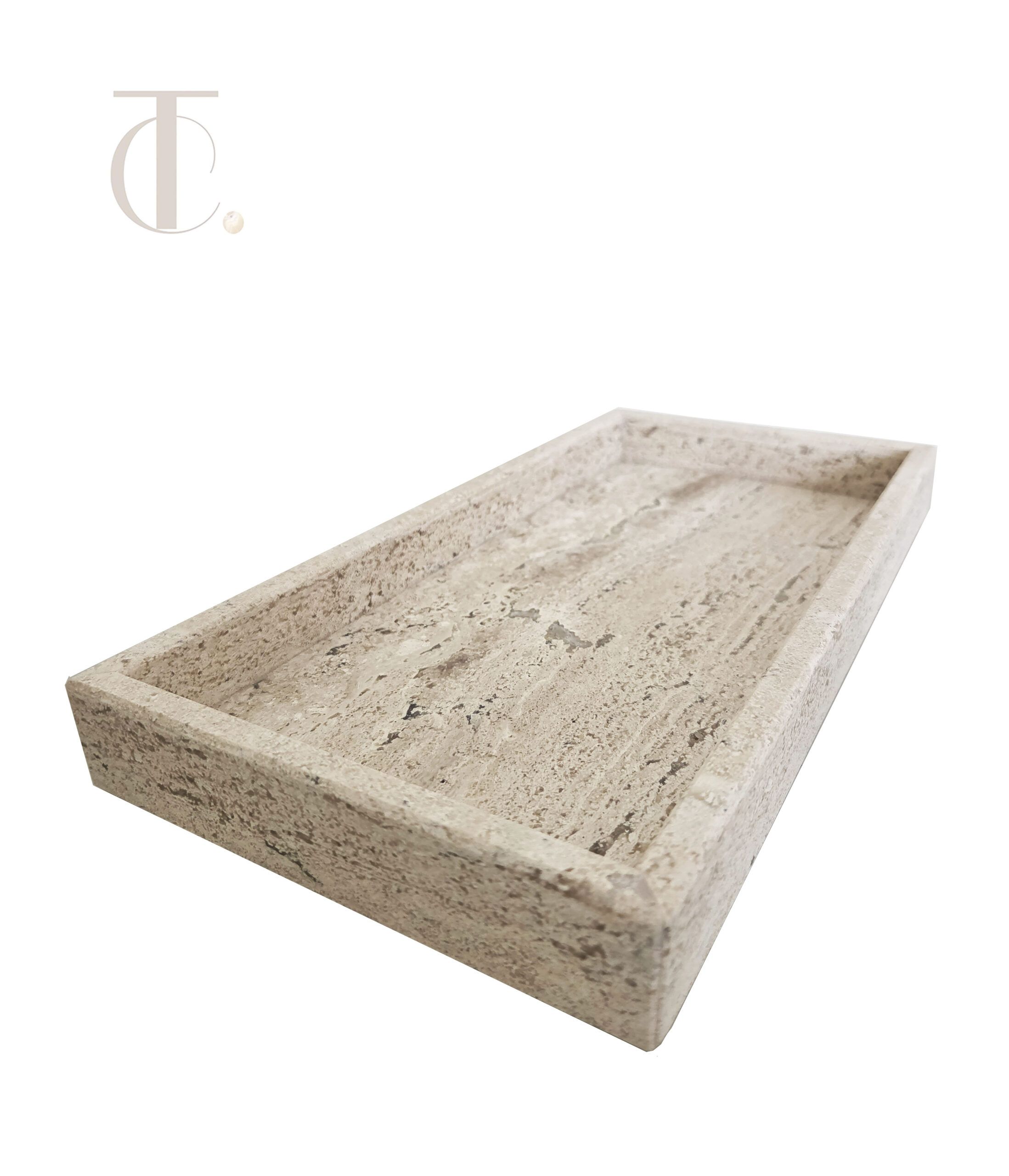 Handcrafted rectangular natural stone amenity tray in light marble for luxury hotel rooms